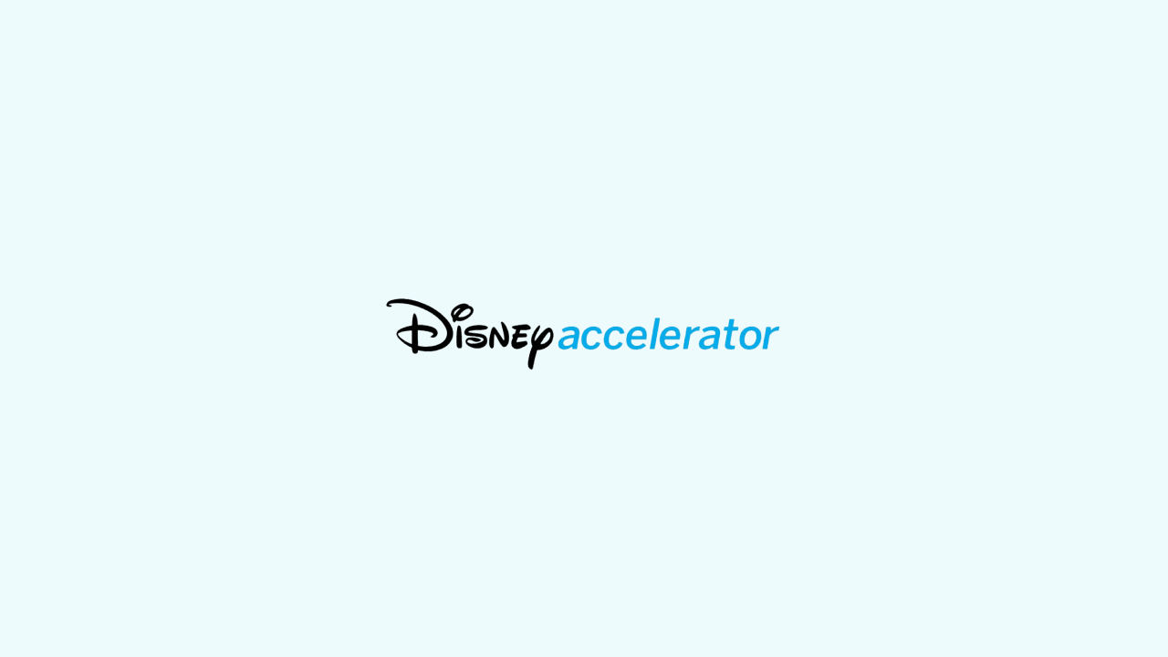 Disney accelerator logo on a light blue background.