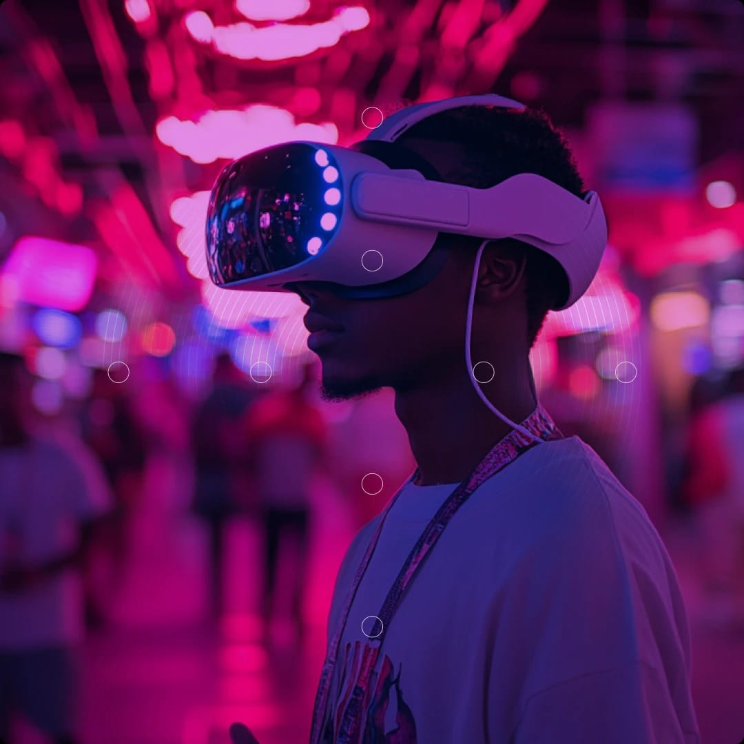 Person wearing a virtual reality headset in a neon-lit environment.