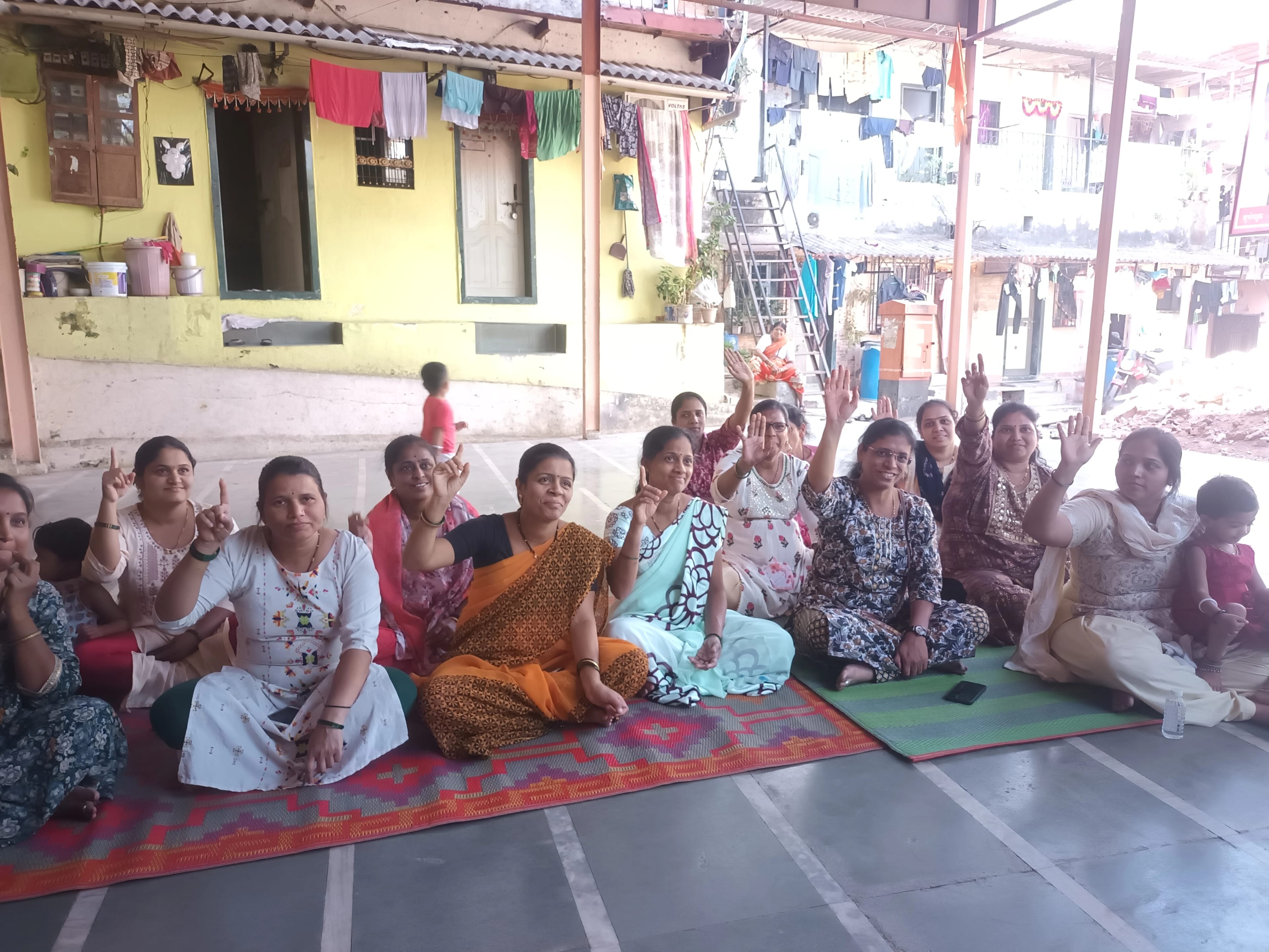 Women raising their hands