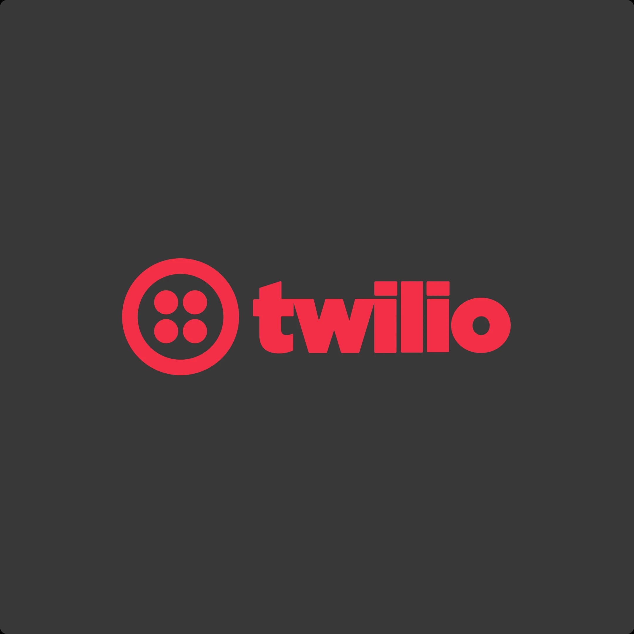 Twilio logo with a red circular icon containing four dots and the word "twilio" in red lowercase letters on a dark background.