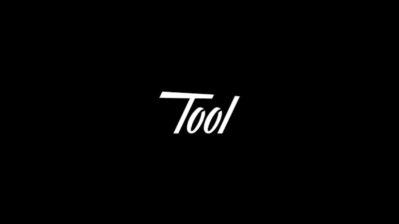 Alt text: The word "Tool" written in white on a black background.