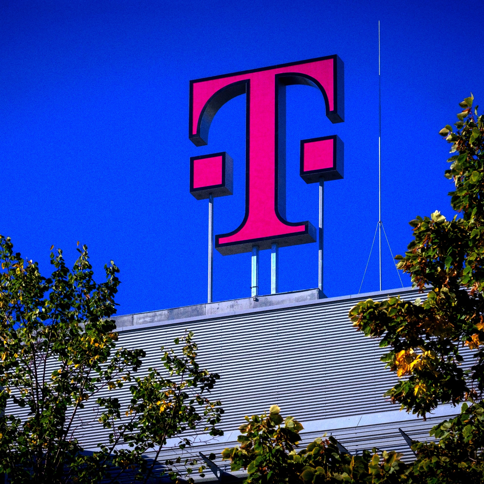 T-Mobile logo in pink on the building.