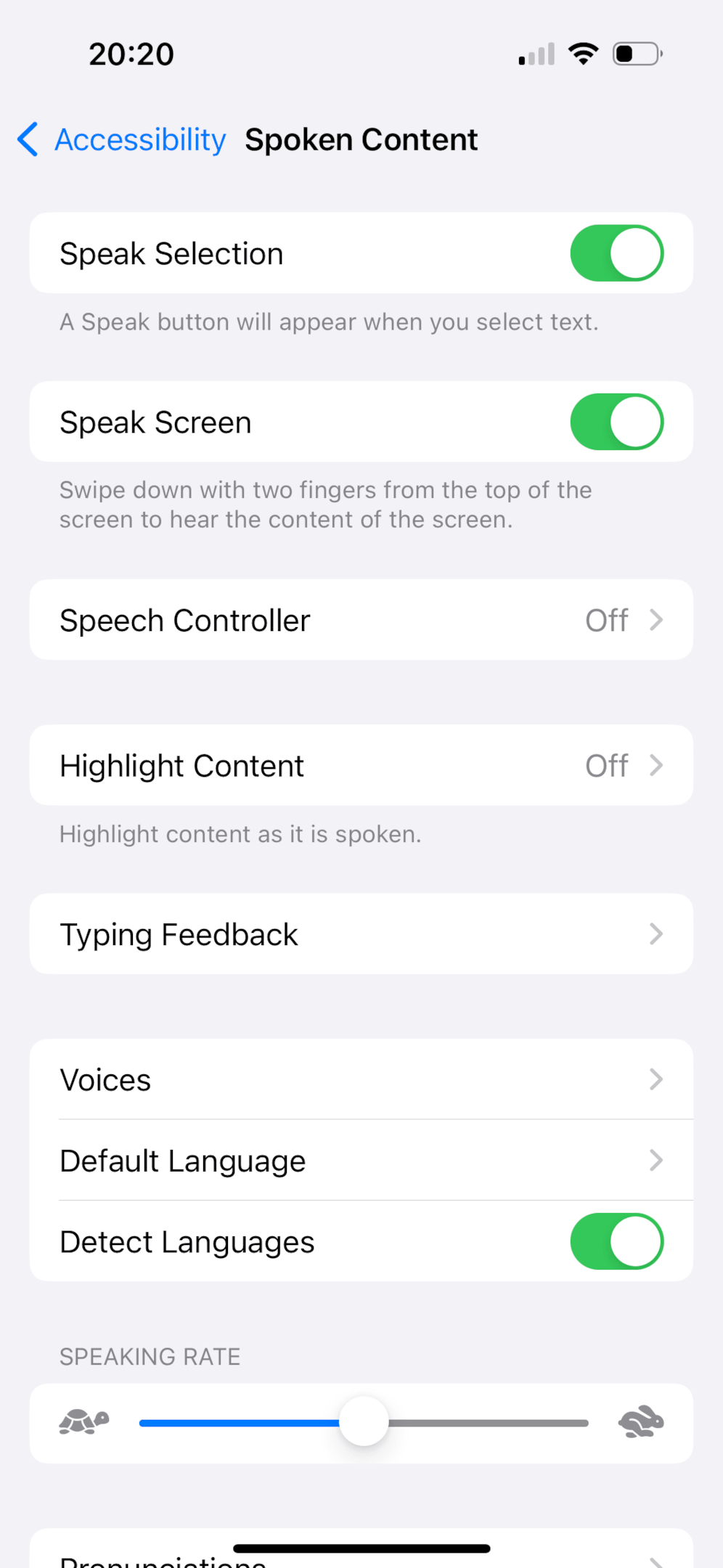 Accessibility settings screen showing options for spoken content, including toggle switches for Speak Selection and Speak Screen, and other speech-related features.