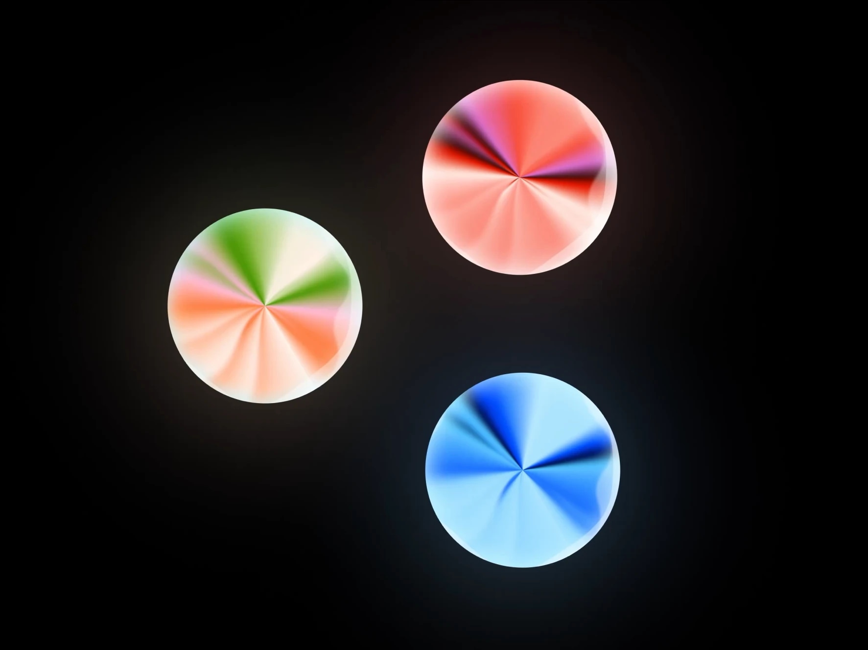 Three colorful, glowing circles with radial patterns on a black background.