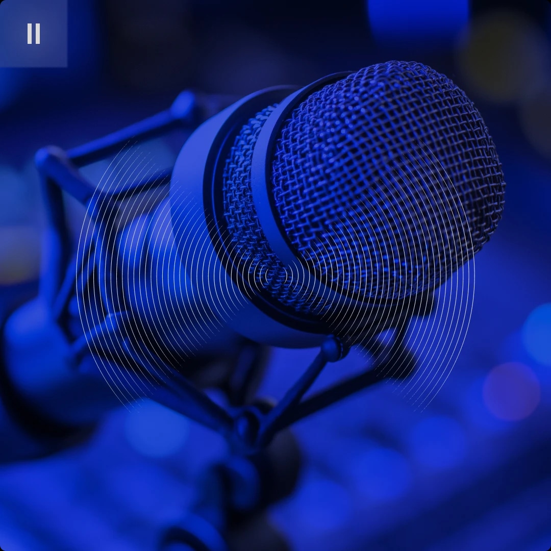 Close-up of a professional microphone with a blue lighting effect.